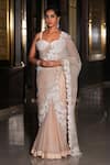 Buy_Nikunj By NIIDHI BAJAJ_Peach Organza Pearls, Lace, Applique Sweetheart Zarina Draped Saree With Corset _at_Aza_Fashions