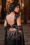 Shop_Nikunj By NIIDHI BAJAJ_Black Net Sequins Sweetheart Neck Sahira Embroidered Lehenga Set _at_Aza_Fashions
