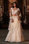Buy_Nikunj By NIIDHI BAJAJ_Cream Net Embroidery, Pearls, Tassels Sweetheart Neck Noorani Lehenga Set _at_Aza_Fashions