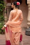 Shop_Nikunj By NIIDHI BAJAJ_Peach Organza, Silk Embroidery, Sequins, Pearls, Stones Pink Hand Kurta Set _at_Aza_Fashions