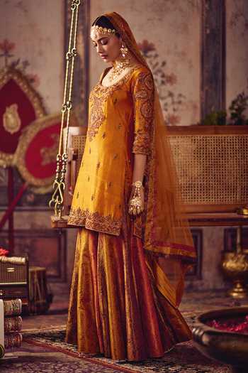 Reeti Arneja_Yellow Silk Zari, Tassels Scoop Neck, Yes Zardozi Kesari Kurta And Sharara Set _at_Aza_Fashions