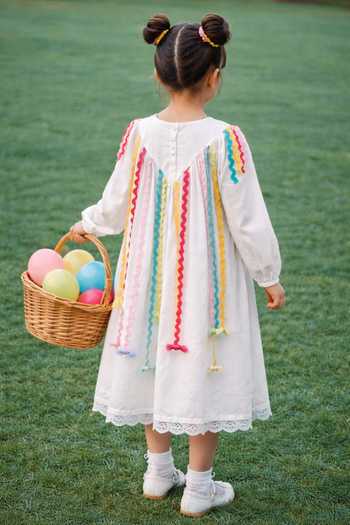 Shop_Rage Attire-Sweta Saria_Off White Cotton, Muslin Bows, Ribbons Fringe Garden Dress _at_Aza_Fashions