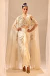 Buy_Sachkiran Bimbra_White Silk, Satin Embroidery, Sequins, Beads, Tassels V-neck Cape Skirt Set _at_Aza_Fashions
