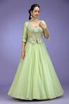 Buy_Jhambthreads_Green Silk, Organza Embroidery, Stones, Tassels V-neck Blouse And Lehenga Set _Online_at_Aza_Fashions