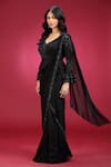Jhambthreads_Black Georgette Sequins, Beads, Pre-draped Saree And Embellished Peplum Top Set _at_Aza_Fashions