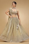 Jhambthreads_Gold Silk, Tissue Embroidery, Sequins, Tassels Sweetheart Tonal Lehenga Set _at_Aza_Fashions