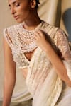Dilnaz_Ivory High Neck Pearl Embellished Short Cape _at_Aza_Fashions