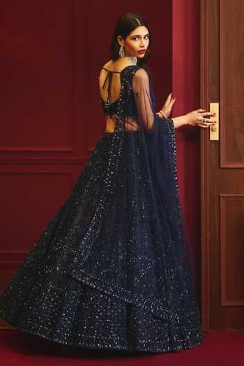 Shop_ANGAD SINGH_Blue Net Sequins, Tassels Scoop Neck Celestial Regency Embellished Lehenga Set _at_Aza_Fashions