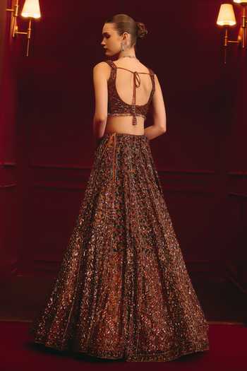 Shop_ANGAD SINGH_Brown Net Sequins, Tassels Sweetheart Neck Carob Majesty Embroidered Lehenga Set _at_Aza_Fashions