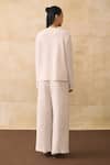 Shop_Pleats By Aruni_Ivory Crepe Round Neck Ganni Textured Pattern Top And Pant Set _at_Aza_Fashions