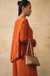 Buy_Pleats By Aruni_Orange Crepe, Satin Round Neck Elnia Top And Pant Set _Online_at_Aza_Fashions