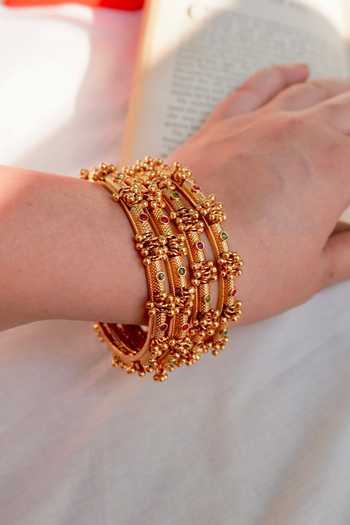 Buy_Prestones_Gold Plated Beads, Stones Ghungroo Embellished Bangles - Set Of 4 _at_Aza_Fashions