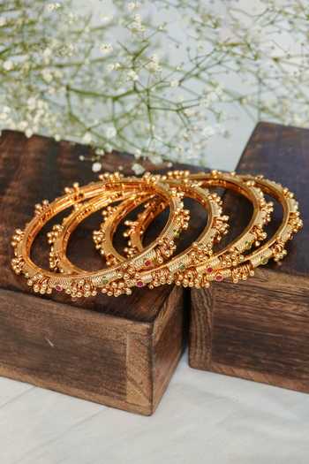 Shop_Prestones_Gold Plated Beads, Stones Ghungroo Embellished Bangles - Set Of 4 _at_Aza_Fashions