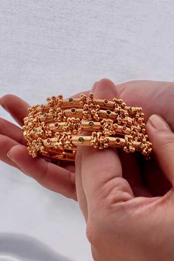 Shop_Prestones_Gold Plated Beads, Stones Ghungroo Embellished Bangles - Set Of 4 _Online_at_Aza_Fashions