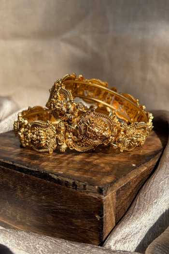 Prestones_Gold Plated Temple Carved Bangles - Set Of 2 _Online_at_Aza_Fashions