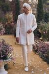 Buy_Seema Gujral_Ivory Silk Embroidery Raw Sherwani Set _at_Aza_Fashions