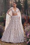 Buy_Seema Gujral_Cream Net Embroidery, Pearls, Sequins V-neck Floral Lehenga Set _at_Aza_Fashions