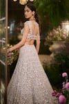 Seema Gujral_Grey Net Sequins, Pearls, Stones, Tassels Tonal Floral Embellished Lehenga Set _Online_at_Aza_Fashions