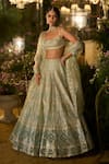 Buy_Seema Gujral_Turquoise Net Embroidery, Sequins, Zari Square Neck Geometric Lehenga Set _at_Aza_Fashions