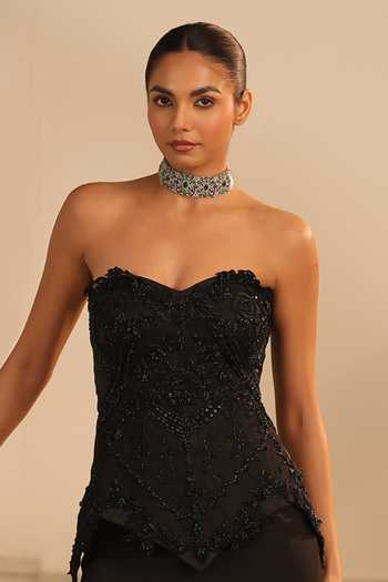 Label Astha Chhabra_Black Crepe, Net Embroidery, Sequins, Beads Tonal Embellished Corset And Skirt Set _at_Aza_Fashions