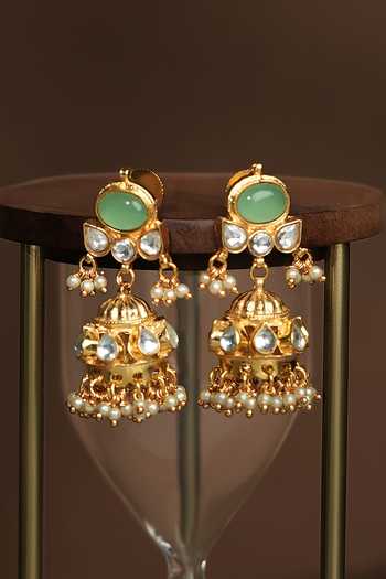 Shop_Riana Jewellery_Gold Plated Pearls, Stones Embellished Jhumkas _at_Aza_Fashions