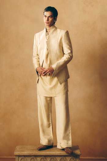 Buy_MUKTI AND KAVITH CASA_Gold Silk, Brocade, Tissue Stripe Woven Jacket And Kurta Set _at_Aza_Fashions
