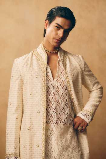 MUKTI AND KAVITH CASA_Ivory Chanderi, Net, Satin, Linen Embroidery Textured Jacket And Kurta Set _Online_at_Aza_Fashions