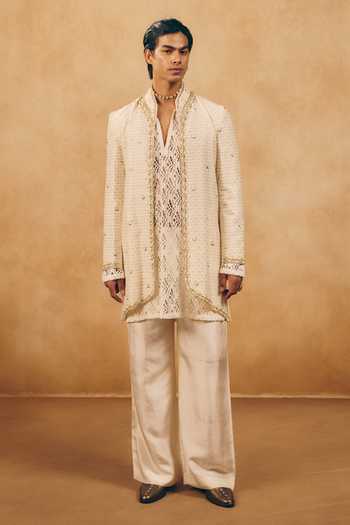 Buy_MUKTI AND KAVITH CASA_Ivory Chanderi, Net, Satin, Linen Embroidery Textured Jacket And Kurta Set _at_Aza_Fashions
