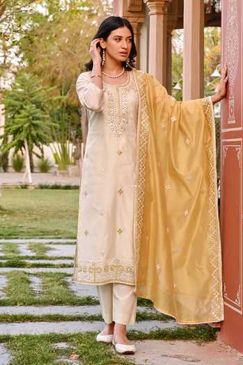 Shop_Karaj Jaipur_Cream Chanderi, Cotton Embroidery, Mirrors Round Neck Kurta Set _at_Aza_Fashions