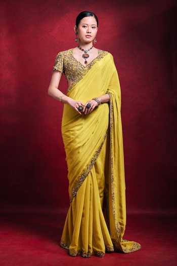 Buy_Tamanna Punjabi Kapoor_Yellow Crepe, Satin Sequins, Pearls, Zari V-neck Saree And Embroidered Blouse Set _at_Aza_Fashions