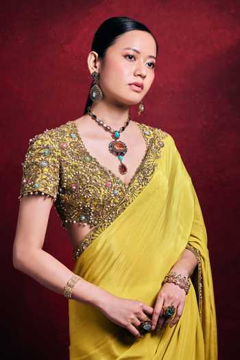 Shop_Tamanna Punjabi Kapoor_Yellow Crepe, Satin Sequins, Pearls, Zari V-neck Saree And Embroidered Blouse Set _at_Aza_Fashions