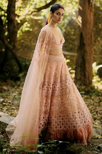 Buy_Surily G_Peach Net Embroidery, Sequins V-neck Lehenga Set _at_Aza_Fashions