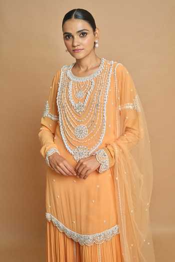 Shop_Surily G_Peach Georgette, Net Pearls, Sequins Round Neck Kurta Set _at_Aza_Fashions