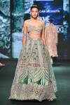 Jigar & Nikita_Teal Net, Tissue, Velvet Embroidery, Beads, Zari, Mirrors Lotus Lehenga Set _at_Aza_Fashions