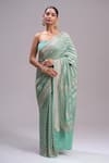 Buy_Mint N Oranges_Green Georgette Zari Stripe Pattern Saree And Unstitched Blouse Piece Set _at_Aza_Fashions