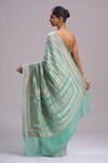 Mint N Oranges_Green Georgette Zari Stripe Pattern Saree And Unstitched Blouse Piece Set _Online_at_Aza_Fashions