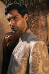 Shop_Jayanti Reddy_Beige Silk Zari Noir Embroidered Raw Sherwani And Pant Set _at_Aza_Fashions