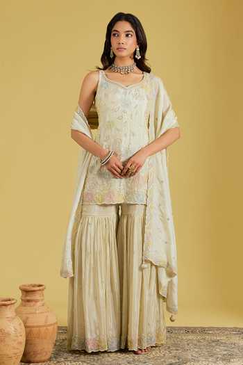 Buy_Meenagurnam_Beige Tissue Embroidery, Sequins, Beads V-neck Flower Jaal Kurta Gharara Set _at_Aza_Fashions
