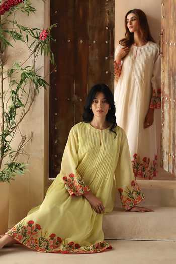 Begum_Yellow Chanderi Silk, Cotton Embroidery Round Neck Swara Dress _at_Aza_Fashions