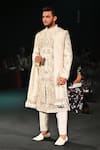 Shop_Jigar & Nikita_Ivory Silk Embroidery, Zari, Tassels The Kingdom Thread Siam Sherwani Set _Online_at_Aza_Fashions