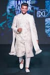 Buy_Jigar & Nikita_Ivory Silk Embroidery, Zari, Tassels The Kingdom Thread Siam Sherwani Set _at_Aza_Fashions