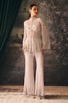 Mani Bhatia_Ivory Net, Chiffon, Satin Embroidery, Sequins, Eira Floral Jacket Sharara Set _at_Aza_Fashions