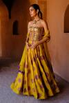 Shop_Drishti & Zahabia_Yellow Silk, Dupion, Organza Embroidery, Navya Shibori Ikat Lehenga Corset Set _Online_at_Aza_Fashions