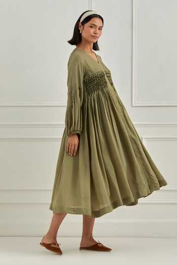 Buy Olive Green Silk Smocking V-neck Smocked Dress For Women by Cupid Cotton Online at Aza Fashions. Buy Olive Green Silk Smocking V-neck Smocked Dress For Women by Cupid Cotton Online at Aza Fashions.