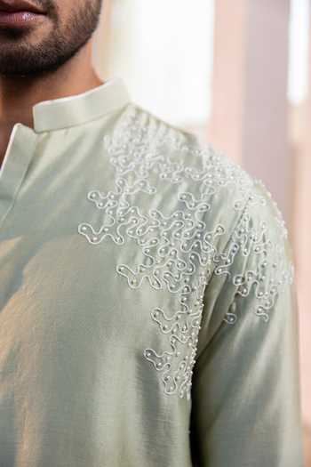 Kaaj Button_Green Cotton, Chanderi Silk, Lycra Embroidery Worms Placement Kurta Set _at_Aza_Fashions