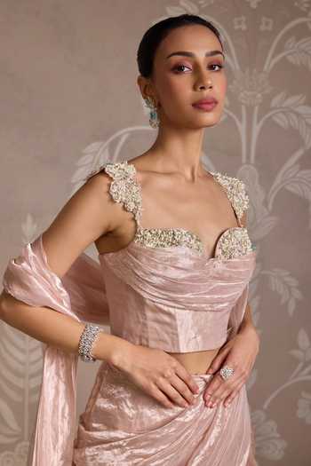 Ridhi Mehra_Rose Gold Tissue Ruffles, Embroidery, Beads Pre-draped Saree With Corset _Online_at_Aza_Fashions