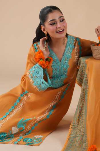 Shop_LAHARIO_Orange Cotton Lace, Pom-poms V-neck Surajmukhi Work Kurta Set _Online_at_Aza_Fashions
