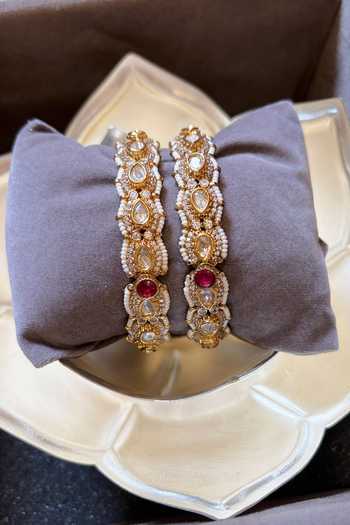Prestones_Red Pearls, Stones, Crystals Polki Embellished Bangles - Set Of 2 _Online_at_Aza_Fashions