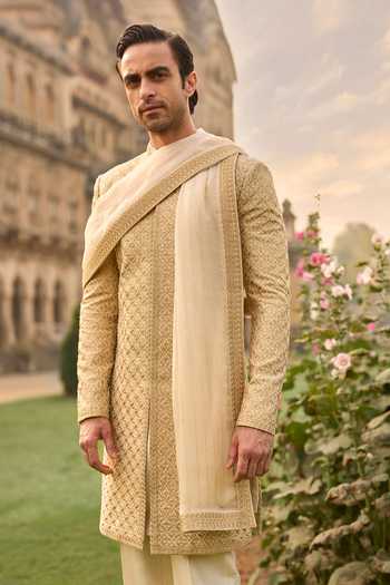 Seema Gujral_Gold Silk Sequins, Beads Thread Embroidered Sherwani Set _Online_at_Aza_Fashions
