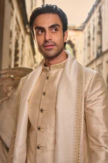 Seema Gujral_Beige Silk, Cotton Embroidery, Sequins, Beads, Zari Raw Sherwani Set _at_Aza_Fashions